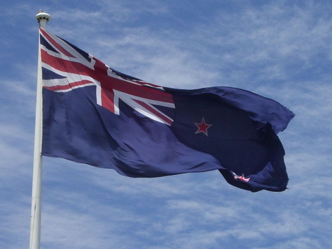 1280px-New_Zealand_flag_at_Auckland_Airport